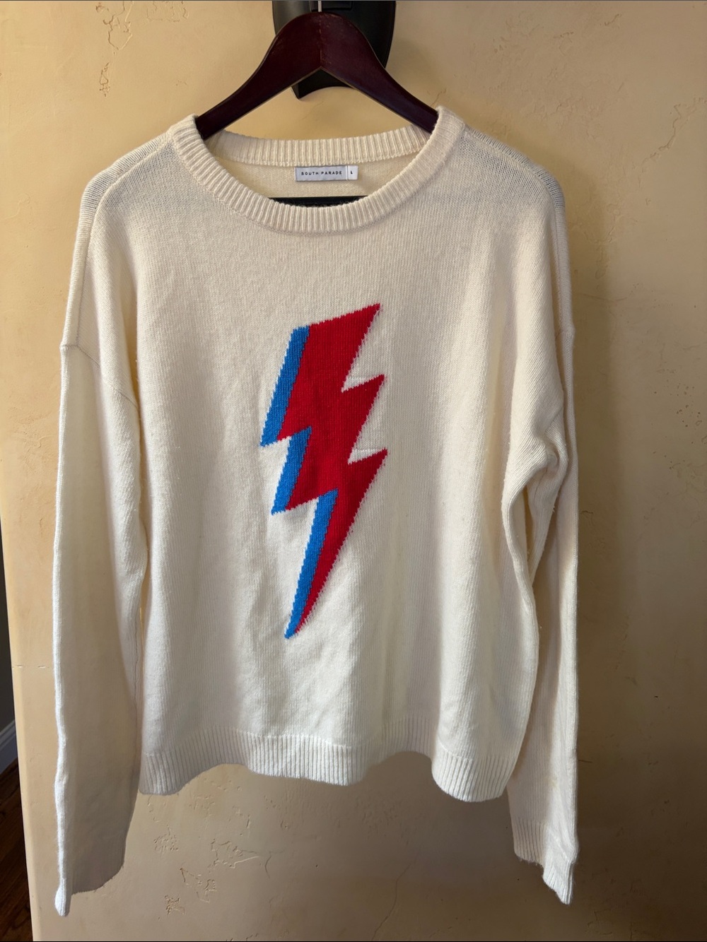 Sz L South Parade Ivory Sweater with Red & Blue Lightning Bolt